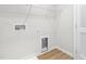 Convenient laundry room setup with washer and dryer hookups and ample space for organization at 611 Silverado Sunset Loop, Wendell, NC 27591
