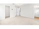 Spacious main bedroom with ensuite bathroom, walk-in closet, and neutral carpeting throughout at 611 Silverado Sunset Loop, Wendell, NC 27591