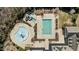 An aerial view of a community pool and splash area at 7100 Hasentree Club Dr, Wake Forest, NC 27587