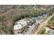 Aerial view of a community clubhouse with a pool, playground, and tennis courts at 7100 Hasentree Club Dr, Wake Forest, NC 27587