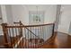 Grand foyer featuring hardwood floors, a staircase, and a pendant light fixture at 7100 Hasentree Club Dr, Wake Forest, NC 27587