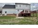 Two-story home with an elevated back deck and grassy yard at 723 Whitt Town Rd Rd, Roxboro, NC 27574
