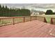 Large wooden deck with a view of the neighboring property at 723 Whitt Town Rd Rd, Roxboro, NC 27574