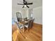 Inviting dining room with modern art, wood table with seating for six, and hardwood floors at 723 Whitt Town Rd Rd, Roxboro, NC 27574