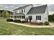 Charming two-story home featuring a welcoming front porch and beautifully landscaped yard at 723 Whitt Town Rd Rd, Roxboro, NC 27574