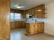 Spacious kitchen featuring wood cabinets, stainless steel appliances, and laminate countertops at 736 Core Rd Rd, Dunn, NC 28334