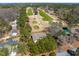 Aerial shot of the home, showing the golf course view and established neighborhood at 7516 Mourning Dove Dr, Sanford, NC 27332