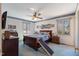 Comfortable bedroom with a large bed, blue decor, and ample natural light creating a restful atmosphere at 7516 Mourning Dove Dr, Sanford, NC 27332