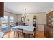 Dining area with wood floors and a chandelier at 7516 Mourning Dove Dr, Sanford, NC 27332
