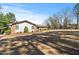 Well-maintained single-story home with a large manicured yard and mature trees in a tranquil setting at 7516 Mourning Dove Dr, Sanford, NC 27332