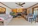 Bright living room with a brick fireplace and sliding door access at 7516 Mourning Dove Dr, Sanford, NC 27332