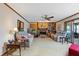 Comfortable living room with a brick fireplace and built-in bookshelves at 7516 Mourning Dove Dr, Sanford, NC 27332