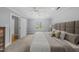 Bright bedroom with neutral decor, carpet, and ceiling fan at 8304 Circlewood Ct, Raleigh, NC 27615