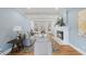 Bright living room with fireplace, built-in shelves, and hardwood flooring at 8304 Circlewood Ct, Raleigh, NC 27615