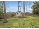 A shed in the yard offers storage space for tools and equipment at 8304 Circlewood Ct, Raleigh, NC 27615
