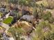 Aerial view of home with mature trees at 100 Dunedin Ct, Cary, NC 27511