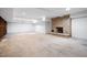 Spacious unfinished basement featuring a brick fireplace, ready for personalization at 100 Dunedin Ct, Cary, NC 27511
