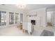 Sitting area with a fireplace and french doors at 100 Dunedin Ct, Cary, NC 27511