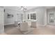 Inviting sitting room with a bay window, plush seating, and an abundance of natural light at 100 Dunedin Ct, Cary, NC 27511