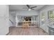 Open dining area with counter seating that overlooks the living room fireplace at 1004 Plateau Ln, Raleigh, NC 27615