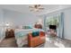 Spacious main bedroom with ceiling fan, window, and cozy decor at 1004 Plateau Ln, Raleigh, NC 27615