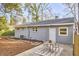 Backyard featuring a patio and landscaped area, perfect for outdoor activities at 101 Newell St, Durham, NC 27705