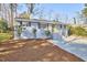 Charming one story brick house with an inviting front yard and well-manicured landscaping at 101 Newell St, Durham, NC 27705
