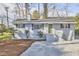 Well-maintained home featuring a welcoming front entrance, landscaping, and classic exterior at 101 Newell St, Durham, NC 27705