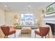 Well-decorated living room showcasing stylish seating, a fireplace, and bright natural light at 101 Newell St, Durham, NC 27705