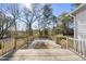 Spacious wooden deck overlooking a lush backyard, perfect for outdoor gatherings at 1012 Mountain Laurel Dr, Raleigh, NC 27603