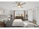 Bedroom with new furniture, curtains, and decorations, bringing in a cozy and welcoming atmosphere at 1012 Mountain Laurel Dr, Raleigh, NC 27603