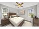 Tastefully decorated bedroom featuring natural light, neutral decor, and comfortable furnishings at 1012 Mountain Laurel Dr, Raleigh, NC 27603