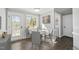 Breakfast nook featuring seating, a window to the backyard, and hardwood floors at 1012 Mountain Laurel Dr, Raleigh, NC 27603