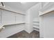 Spacious walk-in closet with custom shelving for optimized storage at 1012 Mountain Laurel Dr, Raleigh, NC 27603