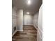 Walk-in closet with vinyl flooring and wire racks for optimal storage at 108 Faucette Dr, Selma, NC 27576