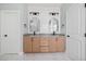 Bathroom featuring double vanity and modern lighting at 110 Purslane Dr, Franklinton, NC 27525