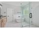 Bathroom with modern shower, standalone tub, and bright lighting at 110 Purslane Dr, Franklinton, NC 27525