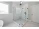 Modern bathroom featuring glass-enclosed shower and stylish tile at 110 Purslane Dr, Franklinton, NC 27525
