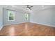 Spacious bedroom with tray ceilings, recessed lighting, and hardwood floors at 110 Purslane Dr, Franklinton, NC 27525