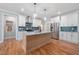Spacious kitchen featuring stainless steel appliances and an island at 110 Purslane Dr, Franklinton, NC 27525