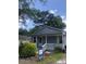 Charming single-story home featuring a well-manicured front yard and inviting entryway at 1111 Lancaster St, Durham, NC 27701