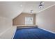 Unique bedroom with blue carpet, recessed lighting, and a charming window nook at 113 Kings Castle Dr, Apex, NC 27502