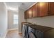 Convenient laundry room with modern washer/dryer set and ample storage space at 113 Kings Castle Dr, Apex, NC 27502