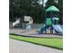 Colorful community playground with slides and climbing structures, offering a fun space for children at 113 Kings Castle Dr, Apex, NC 27502