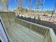 Wooden deck with wood railing overlooking wooded area at 1200 Alston Landing Way # 05, Cary, NC 27519