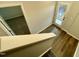 Entryway featuring hardwood flooring, staircase, and white trim at 1200 Alston Landing Way # 05, Cary, NC 27519