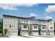 Row of new construction townhomes showing varying exterior paint and stone accents at 1202 Alston Landing Way # 06, Cary, NC 27519