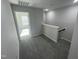 Second floor hallway featuring carpet, neutral walls, and a staircase at 1202 Alston Landing Way # 06, Cary, NC 27519