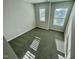 A well-lit bedroom with plush carpet flooring and white trim at 1206 Alston Landing Way # 08, Cary, NC 27519