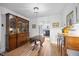 Elegant dining room showcasing hardwood floors and classic furniture at 1303 Dylan Heath Ct, Raleigh, NC 27608